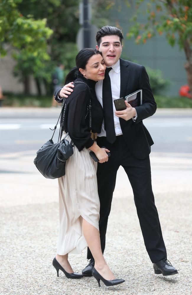 Drew Pavlou with mum Vanessa outside his expulsion hearing at St Lucia. Picture: Annette Dew