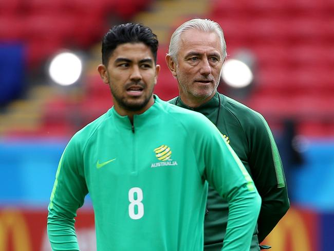 Massimo Luongo (L) was heavily favoured to be given the start by coach Bert van Marwijk (R). Picture: Toby Zerna