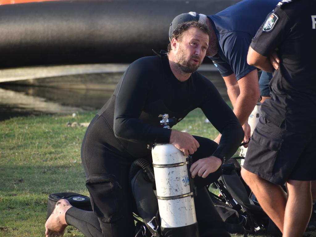 Specialist police divers are searching for the body of a Cairns man who fell into Kinchant Dam on November 2. Photo: Matthew Forrest