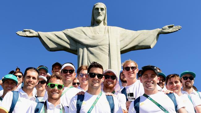 The Australian men’s hockey team pose in front of the Christ the Redeemer statue in Rio.