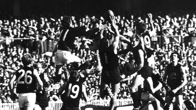 1968 Grand Final. Essendon v Carlton. MCG. Sergio Silvagni marks in front of Geoff Blethyn. Serge Silvagni.