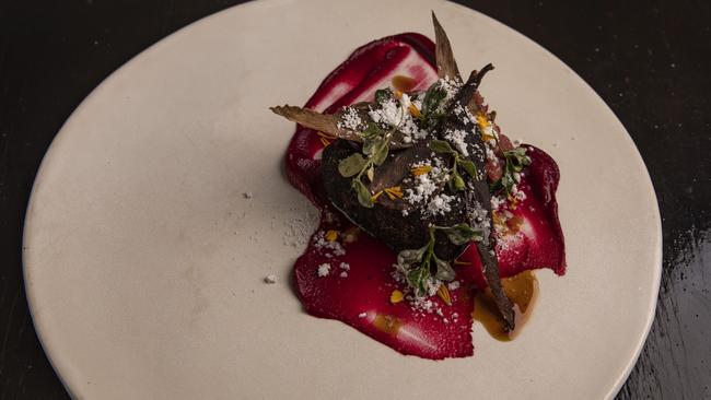 A dish titled “After the Fire” at The Wolfe featuring wagyu, veal, beetroot and eucalyptus. Picture: Mark Cranitch