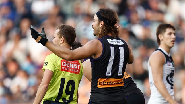 ADELAIDE, AUSTRALIA - APRIL 06: James Aish of the Dockers speaks with the umpire during the 2024 AFL Round 04 match between the Fremantle Dockers and the Carlton Blues at Adelaide Oval on April 06, 2024 in Adelaide, Australia. (Photo by Michael Willson/AFL Photos via Getty Images)