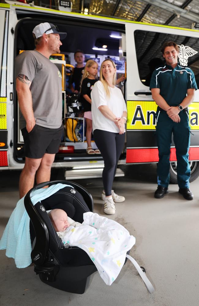 QAS paramedics, Max Westerhof &amp; Brooke Musty meet Mum and dad Natalie and Troy Beecham and baby Cruz Beecham, with Noah 10, Summer 7 and Sonny 4, at Nerang Ambulance Station. Picture: Glenn Hampson