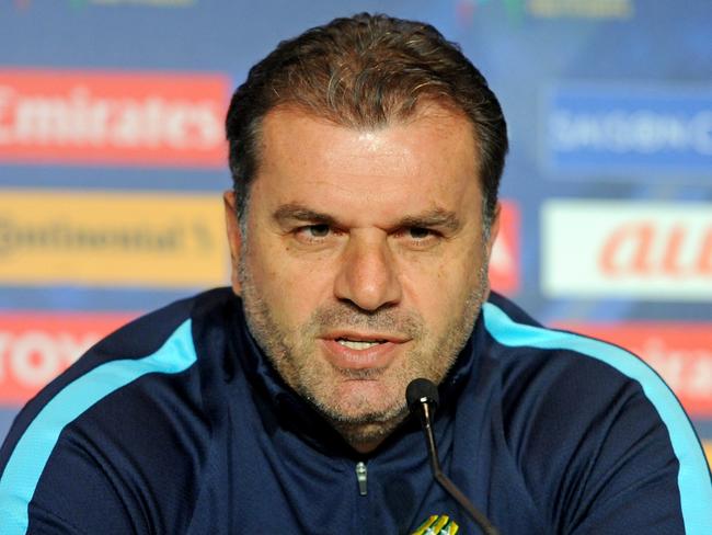 Socceroos coach Ange Postecoglou and Mile Jedinak attend a pre-match press conference in Melbourne, Monday, Oct. 10, 2016. The Socceroos will play Japan in a World Cup qualifier at Etihad stadium tomorrow. (AAP Image/Joe Castro) NO ARCHIVING