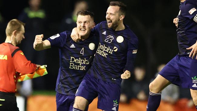 Anthony Pantazopoulos and Matthew Foschini celebrate Oakleigh Cannons’ win.