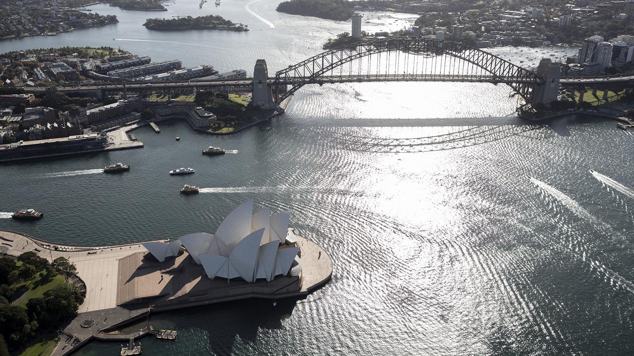 The seven-hour flight begins and ends in Sydney and includes flying over Sydney Harbour, the Sydney Harbour Bridge and the Opera House, some of the most recognisable Australian landmarks in the world. Picture: Getty Images