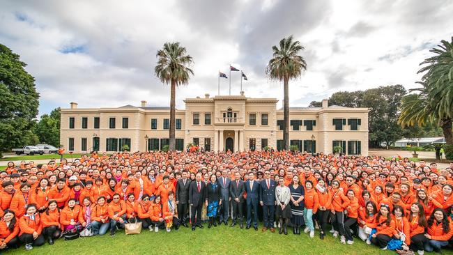 The group of almost 750 Chinese employees from direct-selling company Joymain meet Governor Hieu Van Le at Government House.