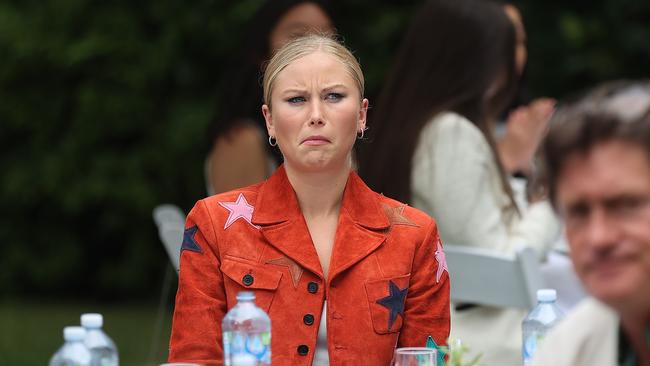 Grace Tame looks unimpressed during the morning tea. Picture: NCA NewsWire / Gary Ramage