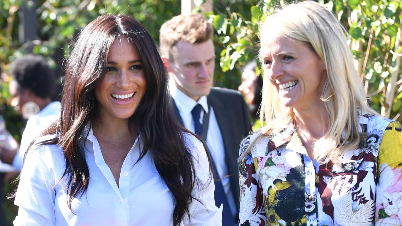 Meghan with Kate Stephens, CEO of Smart Works, at the launch of the Smart Works capsule collection last September.