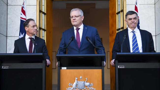 Health Minister Greg Hunt, Prime Minister Scott Morrison and Chief Medical Officer Professor Brendan Murphy. Picture: AAP/Lukas Coch