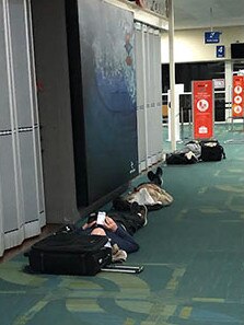 Some Qantas customers on a flight from Sydney to Brisbane slept on the airport floor last week. Picture: Supplied/2GB Radio