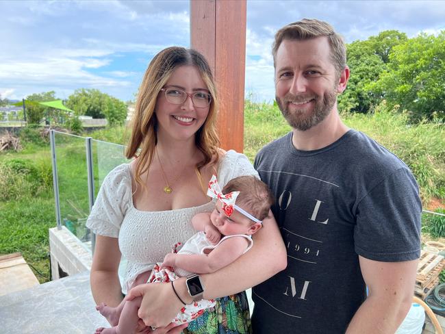 Paige Dippl, 30, Timothy Dippl, 38, with their four-month-old daughter, Harriet. Picture: Supplied