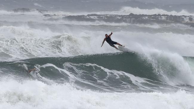 A surfer comes unstuck at Kirra on Sunday. Picture: NCA NewsWire/Steve Holland