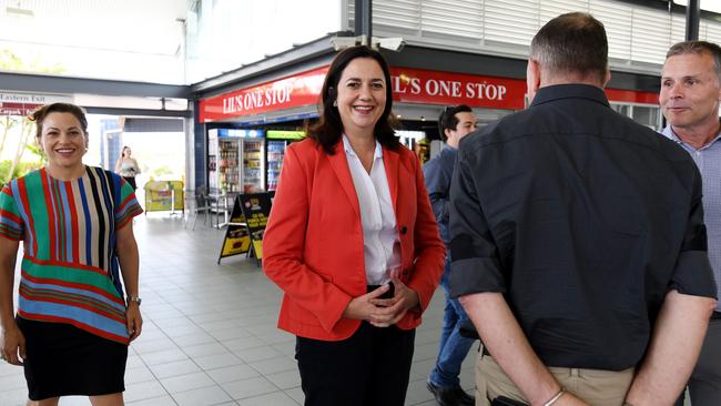 Premier Annastacia Palaszczuk walks through Robina train station before making an announcement on new stations. (AAP Image/Tracey Nearmy)