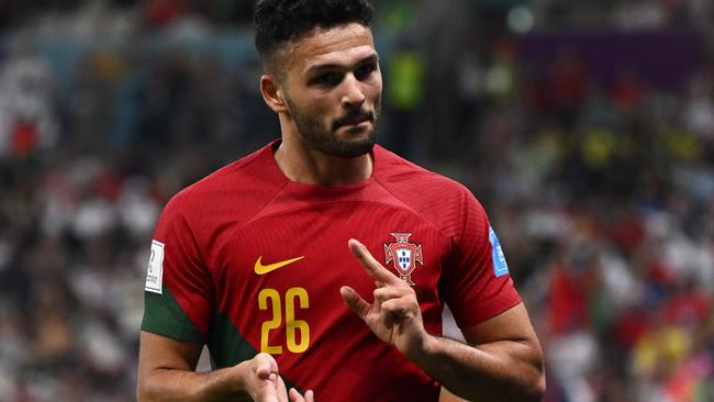 Portugal's forward #26 Goncalo Ramos celebrates scoring his team's third goal.