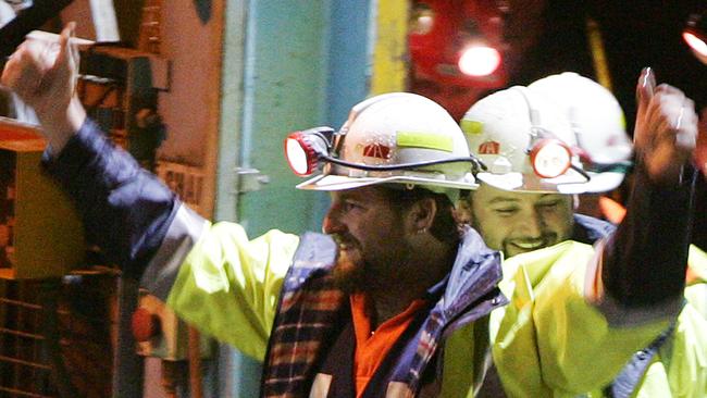 Brant Webb and Todd Russell emerge from the mine after their incredible rescue.