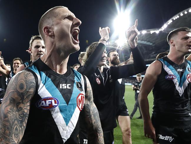 A pumped Hamish Hartlett celebrates the Power’s 2020 qualifying final win over Geelong at Adelaide Oval.