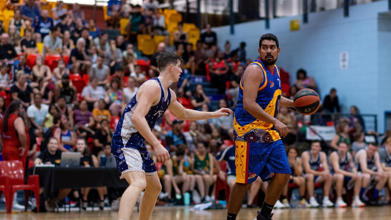 Alex Weetra dribbles under pressure in Darwin Basketball Men's Championship Round 20: Ansett v Tracy Village Jets. Picture: Che Chorley