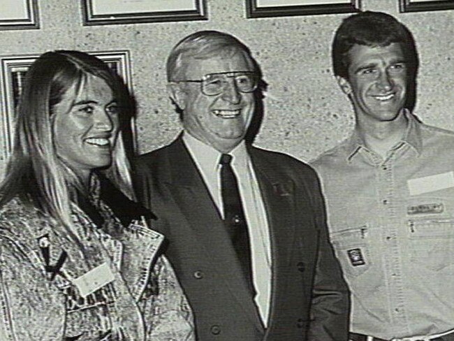 Professional surfers Pam Burridge and Barton Lynch with Warringah Shire President Brian Green at a reception in 1991 for the competitors in the Coca Cola Bottlers Surf Classic held at North Narrabeen Beach. Picture: Northern Beaches Council Library