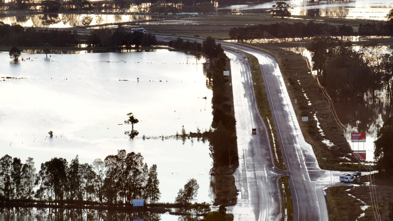 Five people dead in NSW floods as BOM warns of continuing risk
