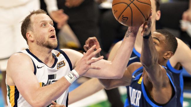 Utah’s Joe Ingles drives against OKC’s Darius Bazley. Picture:Wesley Hitt/Getty