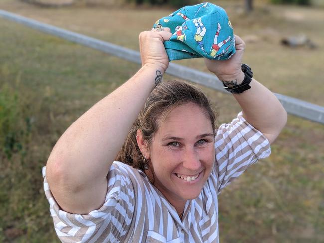 HAPPY CAP: When Natasha Anderson lost her job due to coronavirus, she turned to volunteering and has since sewn and given away 35 brightly coloured scrub caps to health workers in the region. Photo: Ebony Graveur