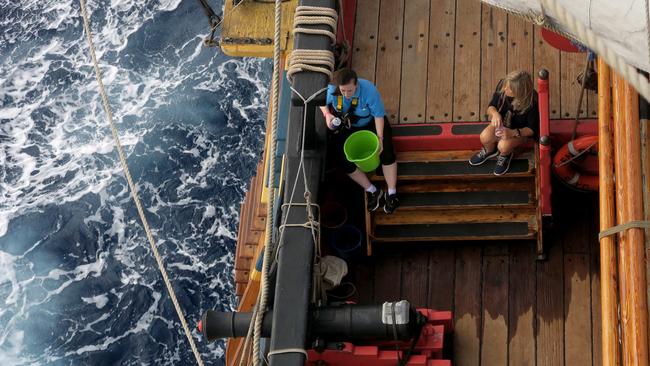 Nicole Fogarty, 27, from Albury in NSW (left) spent the first four days of the journey with a bucket nearby after suffering from sea sickness. Picture: Toby Zerna