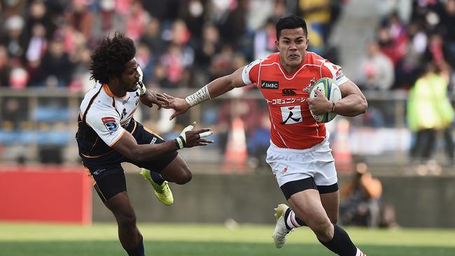 Hosea Saumaki of the Sunwolves takes on the defence of Henry Speight of the Brumbies.