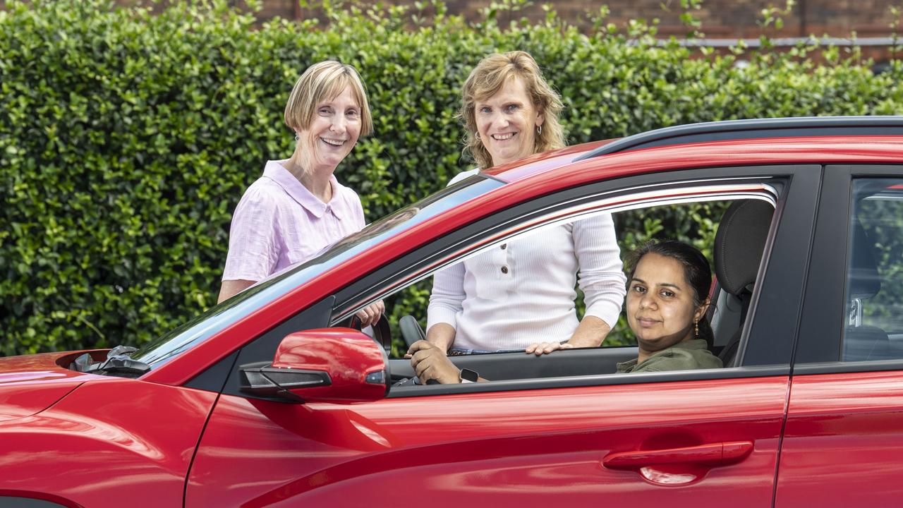 Carole Rogan, St Vincent de Paul Society Road to Equality Learner Driver Program Coordinator, Glenn Provest, Walk No More instructor and her student Manvi Seal. Friday, April 1, 2022. Picture: Nev Madsen.