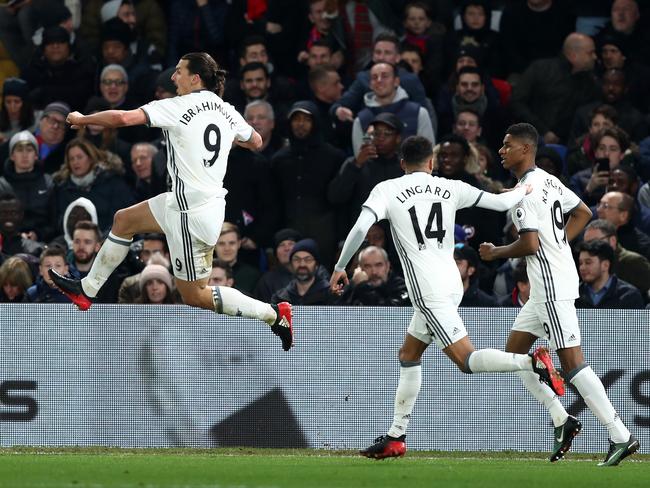 Zlatan Ibrahimovic (L) of Manchester United celebrates.