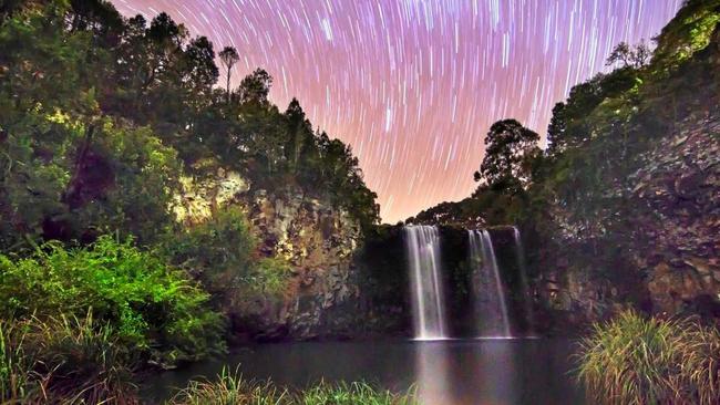 THE STARS SPIN BRIGHT: Dangar Falls as captured by   Advocate   r e ader Adam Dederer in this stunning landscape using a long exposure bulb setting. Picture: Adam Dederer