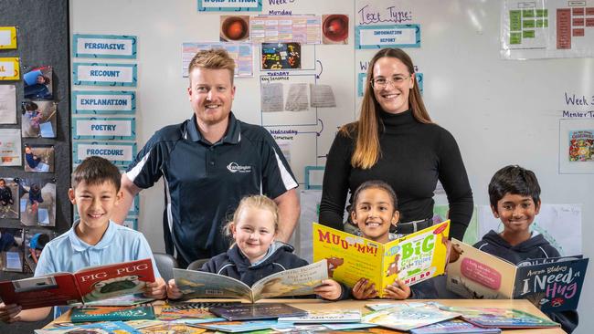 Whittington Primary School ranked in the top five schools with the least crowded classrooms in the Geelong region. Teachers Shannon Griffin and Darcy Wilson read with students Abilesh Punniyamoorthy, Evie-Jayde Connelly, Mumbi Njogu and Logan Shrestha. Picture: Brad Fleet