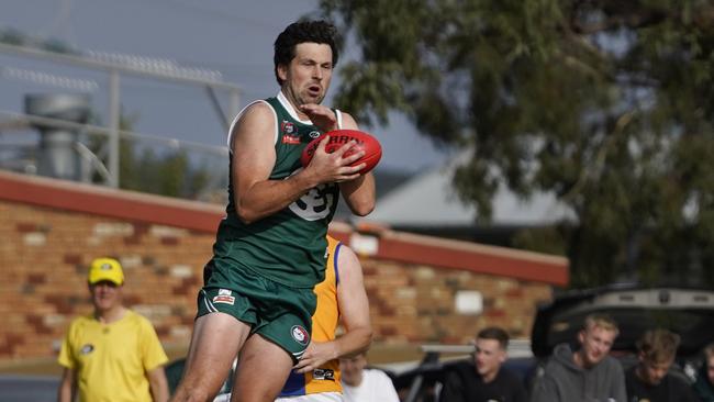 Harvey Daniher marks on the lead. Picture: Valeriu Campan