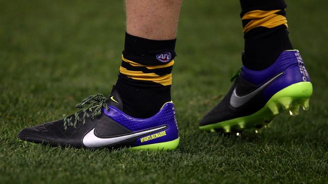 Jack Riewoldt of the Tigers wears boots with the slogan #FightLikeMaddie in honour of his late cousin,  Maddie Riewoldt. Picture: Robert Cianflone/Getty Images