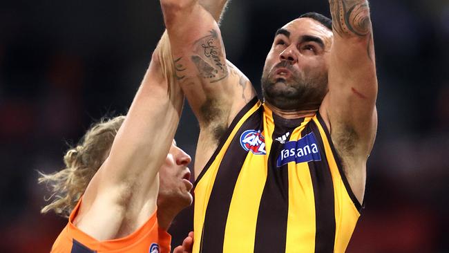 Hawthorn's Shaun Burgoyne spoiled by Giants Nick Haynes during AFL match between the GWS Giants and Hawthorn at Giants Stadium. Picture. Phil Hillyard