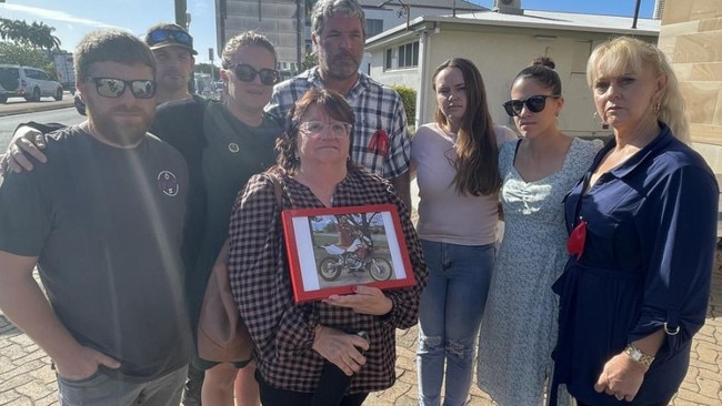 The Roy family took a photo of their beloved son and brother to the first court hearing of the driver charged over the crash that killed Brayden.