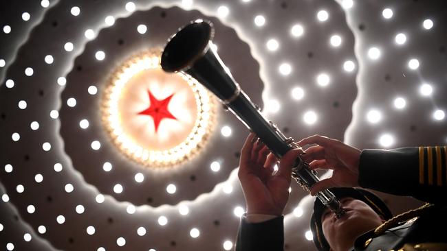 A musician lets rip in Beijing’s Great Hall of the People on Friday. Picture: AFP