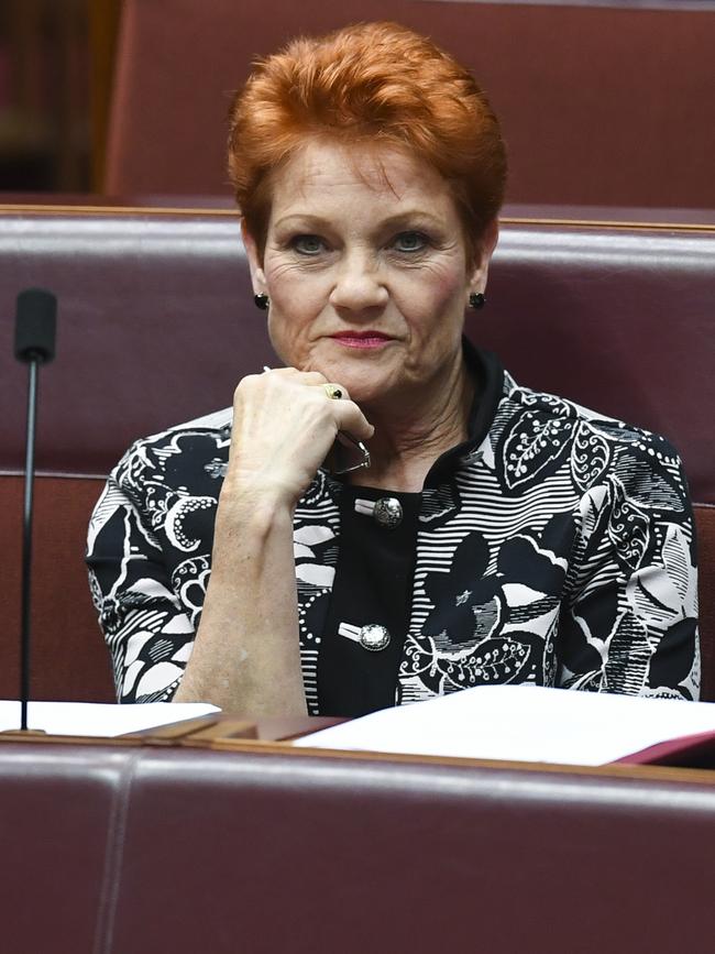 One Nation party leader Pauline Hanson reacts during debate in the Senate chamber on  Monday. Picture: AAP Image/Lukas Coch