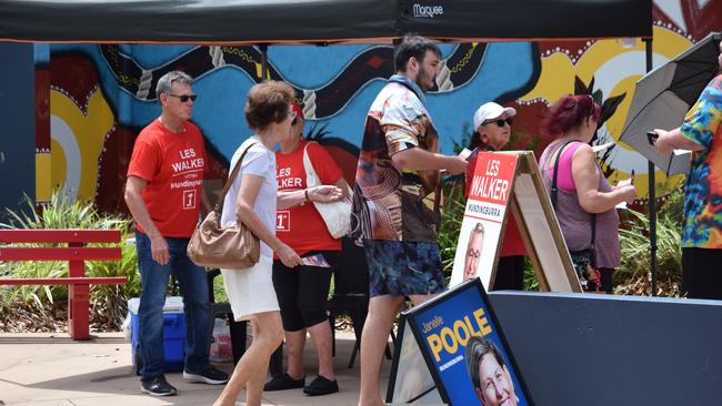 Mundingburra candidates Les Walker, Janelle Poole and Michael Pugh meet with early voters on October 14. Photo: Daniel Shirkie.