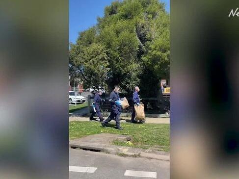 Forensic officers gather evidence in Daylesford