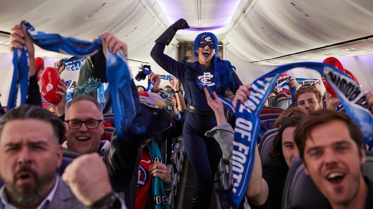 Blues fans joined players on the flight . Picture: Virgin Australia