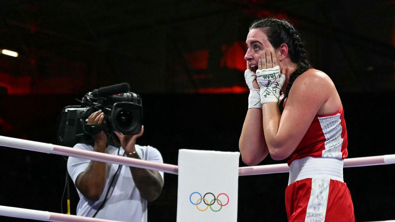 Parker reacts to her quarter-final win. (Photo by MOHD RASFAN / AFP)