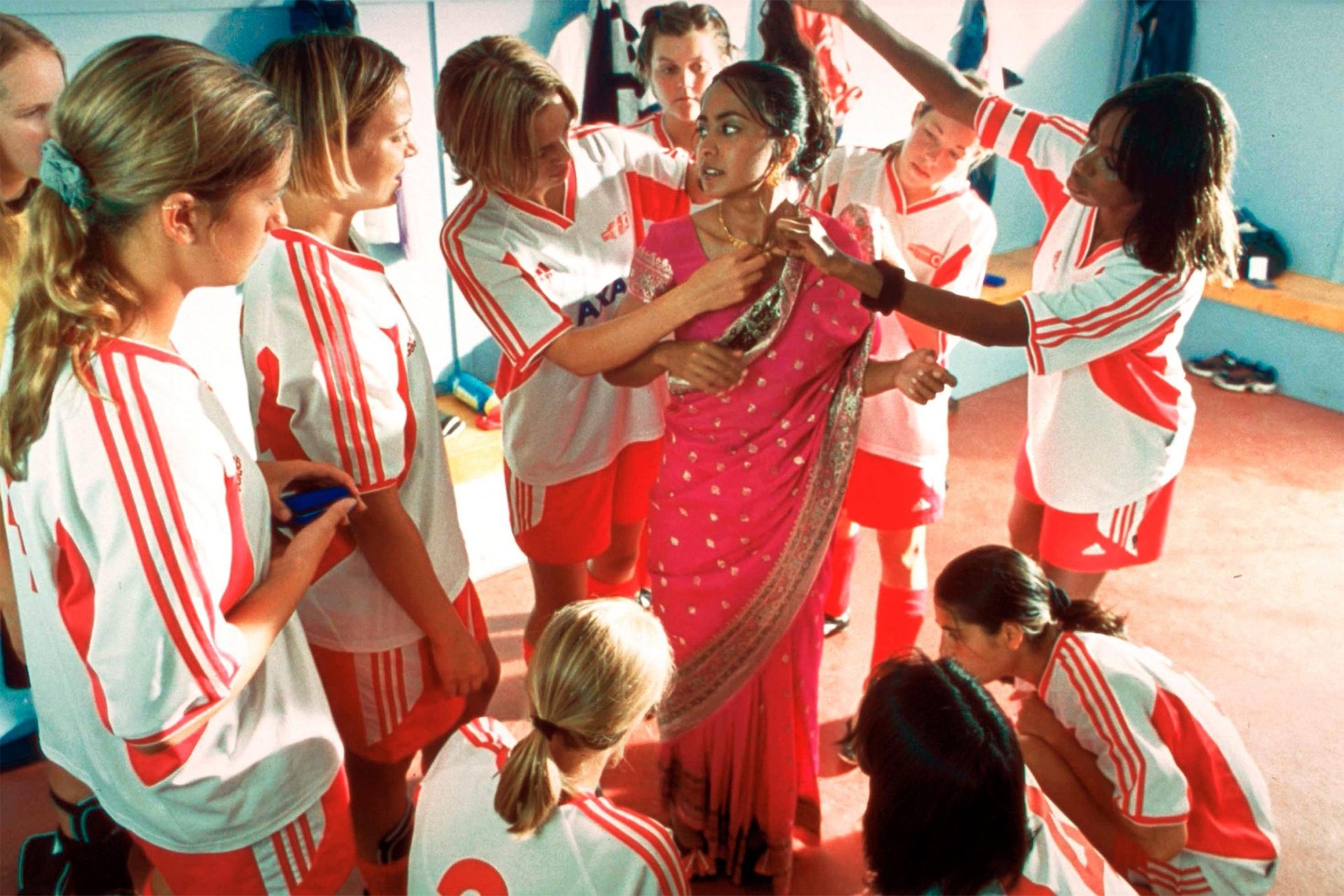 <p><em>Image credit: Searchlight Pictures</em></p><h3><em>Bend It Like Beckham (2002)</em></h3><p>This classic British teen flick is up there with one of our most favourite coming of age movies of all time. The film follows Jesminder "Jess" Bhamra and her friend Jules Paxton, played by Kiera Knightley, as they pursue their passion for football against their parents wishes. While Jess deals with cultural and parental pressure to conform and give up her dreams, this movie is all about pursuing your them no matter what and becoming the person you are meant to be. It's feel good, it's emotional, it's got female sports <em>and</em> a good love story—it's <em>everything</em>.</p>