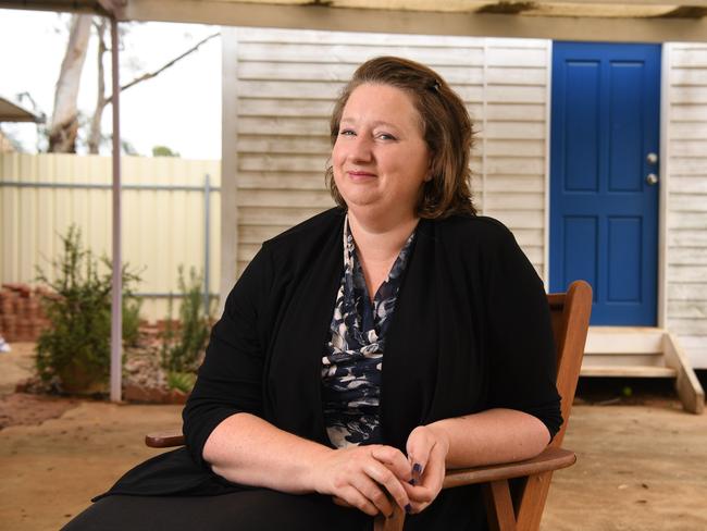 Emma Jackson out the front of her granny flat. The mother of five has rented it out to a woman, and her daughter, who have escaped domestic violence. Picture: Tricia Watkinson