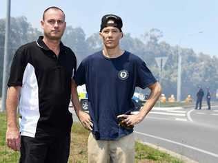 Mates Jason Brinkley (right) and Joseph Cooper (left) were evacuated from Joseph's Peregian Beach home this morning. Photo: Patrick Woods