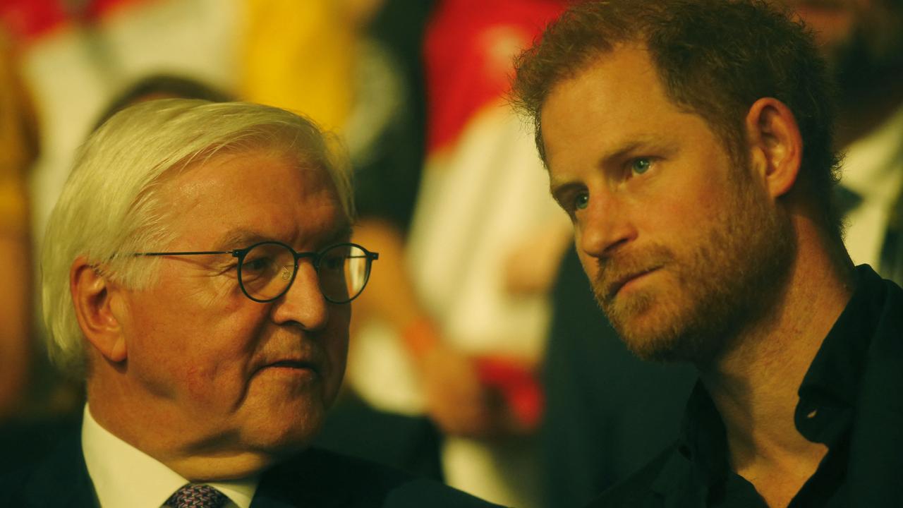 Harry, Duke of Sussex, with German President Frank-Walter Steinmeier during the closing ceremony of the Invictus Games. Picture: Leon Kuegeler/AFP