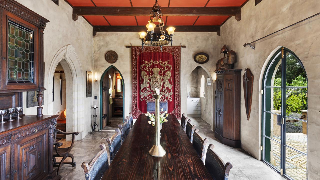 Owner Fabio Versace built an Oregon timber dining table that can sit 10 people for the dining room, also called the grand room.