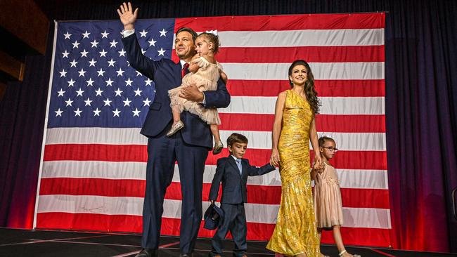 Republican Ron DeSantis with his wife Casey DeSantis and children Madison, Mason and Mamie, waves to the crowd during an election night party in Tampa, Florida.