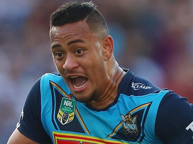 GOLD COAST, AUSTRALIA - JULY 29:  Phillip Sami of the Titans makes a break to score a try during the round 20 NRL match between the Gold Coast Titans and the New Zealand Warriors at Cbus Super Stadium on July 29, 2018 in Gold Coast, Australia.  (Photo by Chris Hyde/Getty Images)